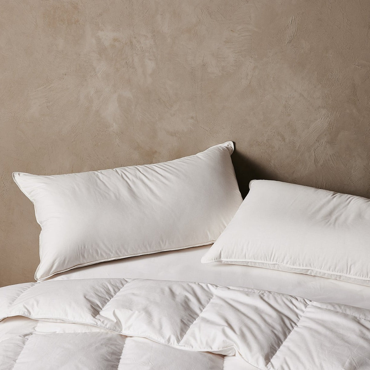 How to Care for Your Feather & Down Bedding (Without Ruining It)